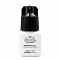 BDTL 647 clear lash adhesive bottle on a plain background